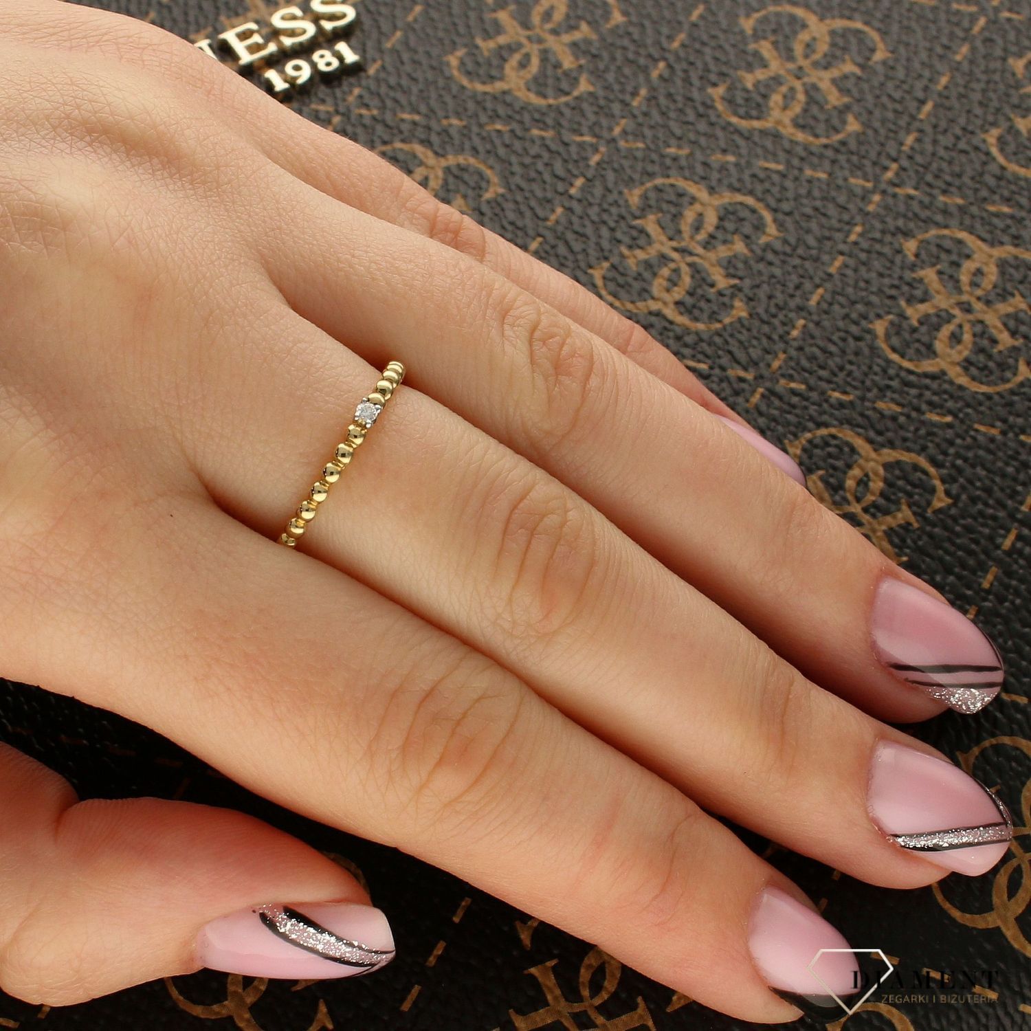 Złoty pierścionek z Diamentem złączone kuleczki 585 KR-99640 (1).jpg