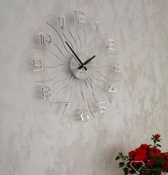 Zegar ścienny 49cm z kryształkami Cristal LAVVU srebrny LCT1220. Efektowny zegar ścienny do salonu. Kolor srebrny. Metalowe promienie. Mechanizm kwarcowy. Świetna ozdoba każdego nowoczesnego wnętrza (1).JPG