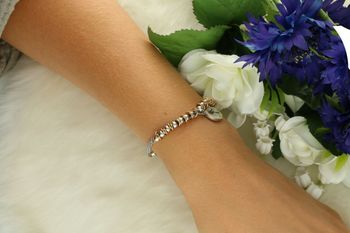 Elegancka bransoletka La Petite Story LPS05AQL04 w odcieniach srebra i różowego złota z zawieszką chłopca. Symbol miłości i rodziny. Designerska biżuteria z brassu, idealna na prezent.3.jpg