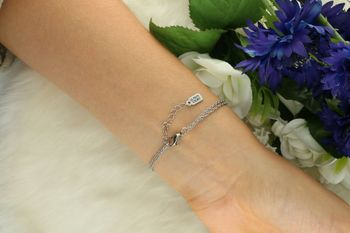 Elegancka bransoletka La Petite Story LPS05AQL04 w odcieniach srebra i różowego złota z zawieszką chłopca. Symbol miłości i rodziny. Designerska biżuteria z brassu, idealna na prezent.4.jpg