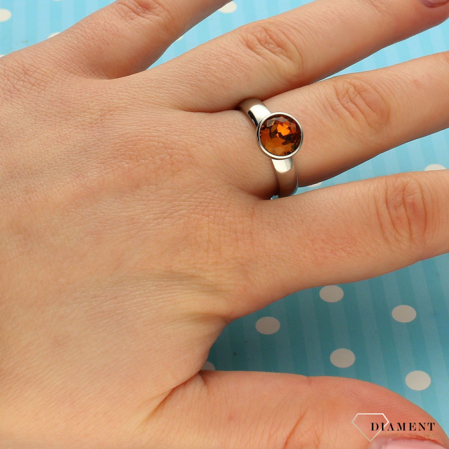 Pierścionek z pomarańczowym oczkiem Melano srebro M01SR 5012 p (2).jpg