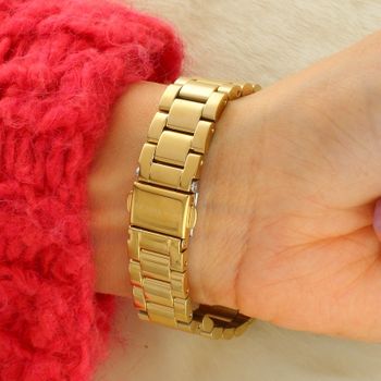 Michael Kors MK4737 Lauryn to damski zegarek analogowy z mechanizmem kwarcowym, tarczą sunray, szkłem mineralnym i kopertą 33 mm. Wodoszczelność 50 m, jednokierunkowa ramka oraz elegancka bransoletka.4.jpg