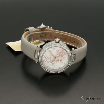 Zegarek damski z pięknym szarym paskiem. Tarcza zegarka została ozdobiona, modnym kwiecistym wzorem. Idealny pomysł na prezent dla ukochanej kobiety.  (3).jpg