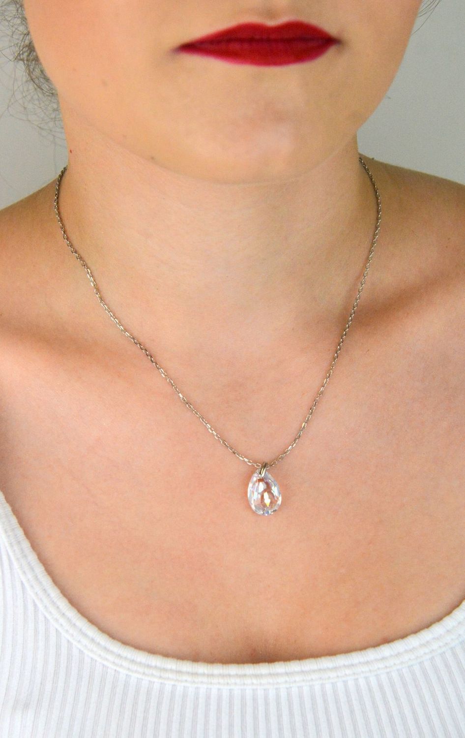 Elegancki naszyjnik Spark Two Faces NBACK6433CSH wykonany z srebra próby 925 pokrytego platyną, ozdobiony kryształami Crystal Shimmer i Aurora Borealis. Długość łańcuszka 59 cm (42 cm + 17 cm pr.jpg