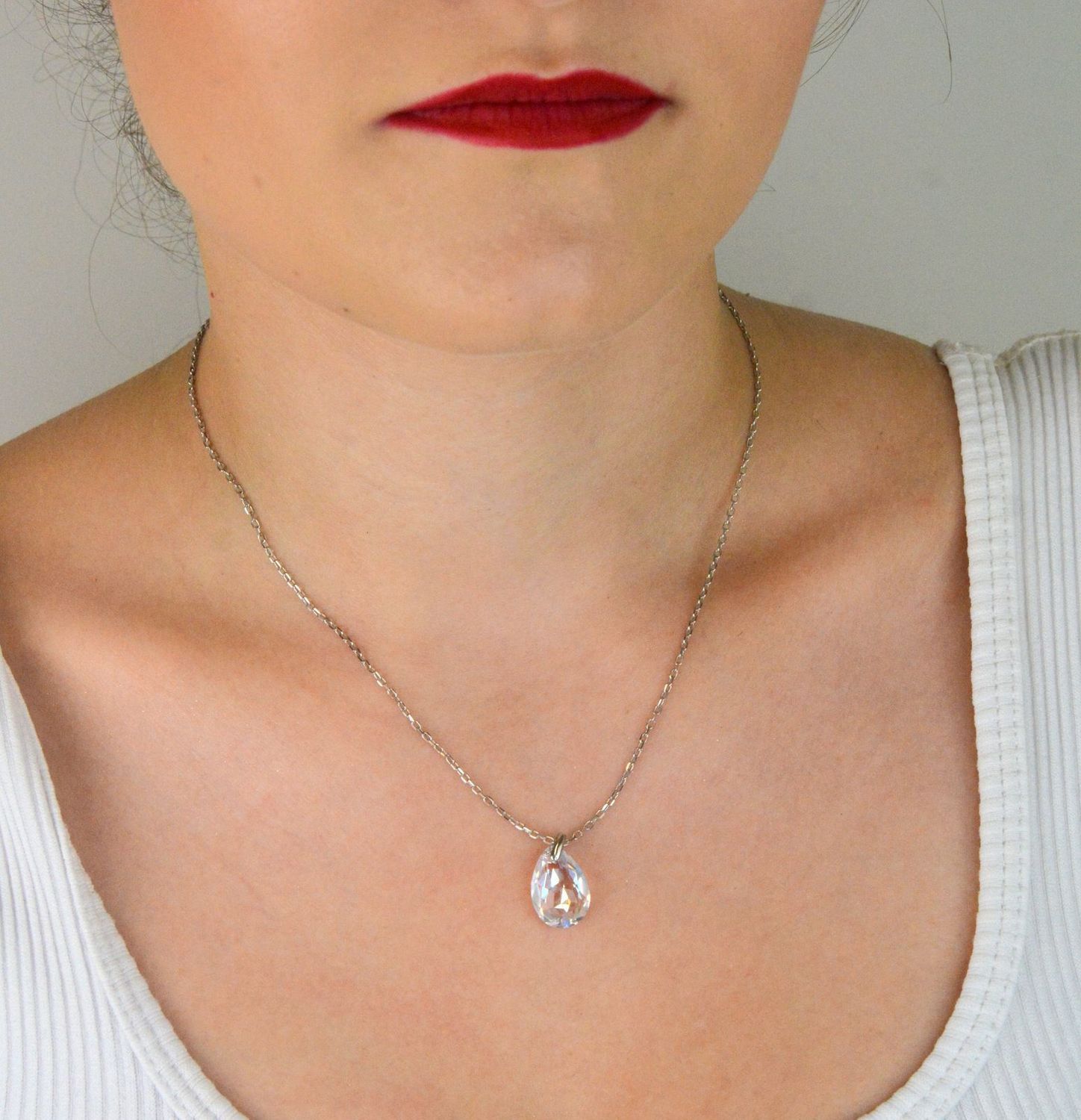 Elegancki naszyjnik Spark Two Faces NBACK6433CSH wykonany z srebra próby 925 pokrytego platyną, ozdobiony kryształami Crystal Shimmer i Aurora Borealis. Długość łańcuszka 59 cm (42 cm + 17 cm pr.jpg