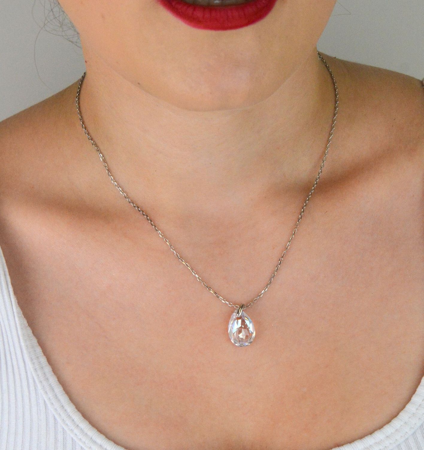 Elegancki naszyjnik Spark Two Faces NBACK6433CSH wykonany z srebra próby 925 pokrytego platyną, ozdobiony kryształami Crystal Shimmer i Aurora Borealis. Długość łańcuszka 59 cm (42 cm + 17 cm pr.jpg