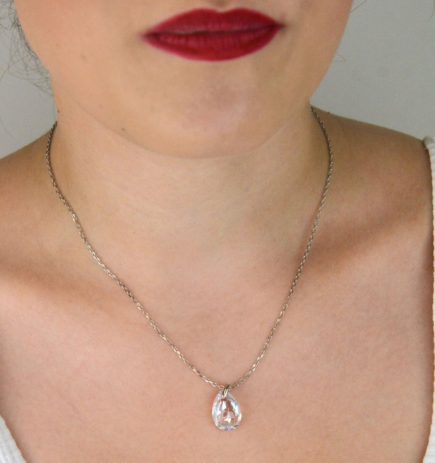 Elegancki naszyjnik Spark Two Faces NBACK6433CSH wykonany z srebra próby 925 pokrytego platyną, ozdobiony kryształami Crystal Shimmer i Aurora Borealis. Długość łańcuszka 59 cm (42 cm + 17 cm pr.jpg