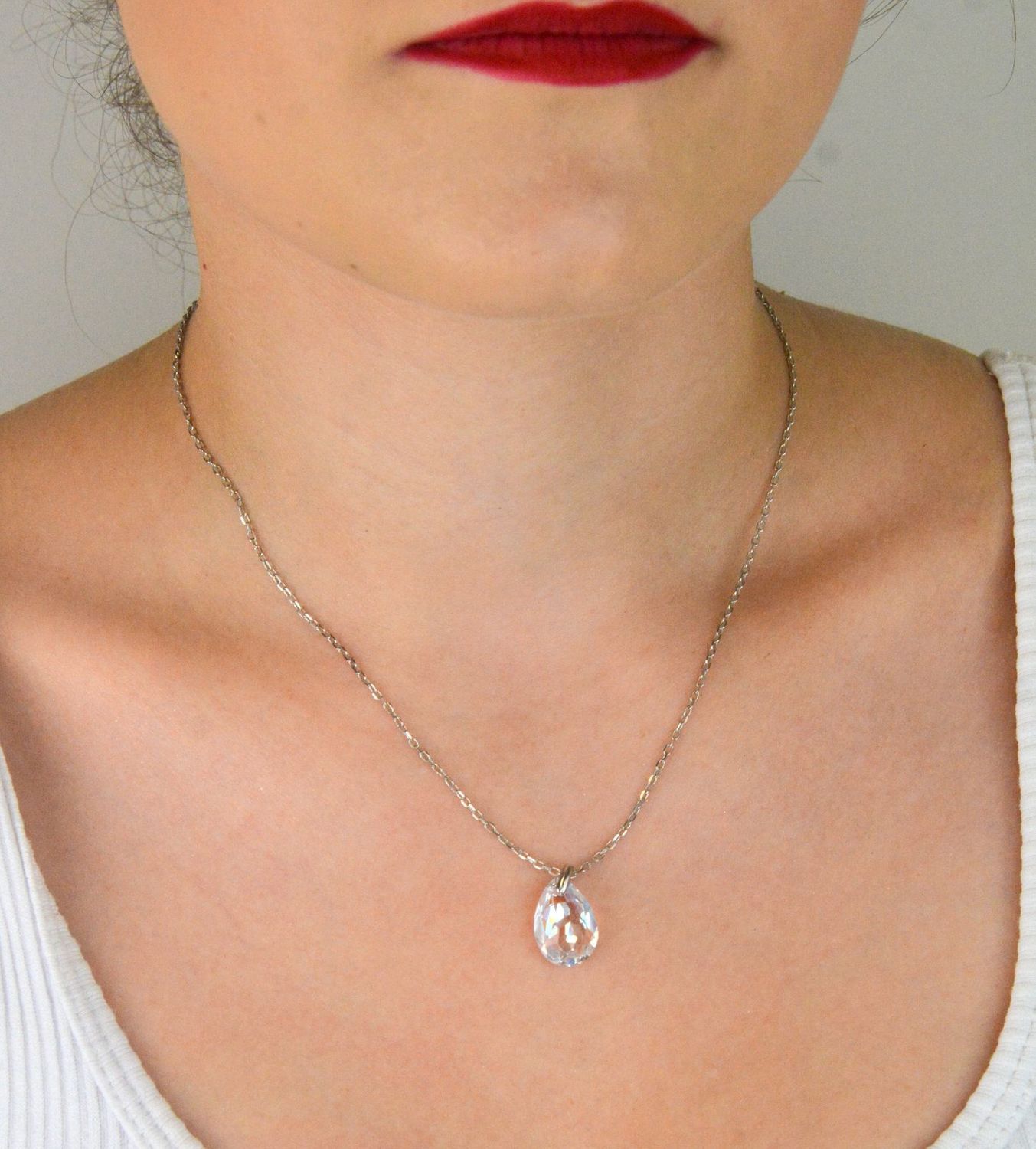 Elegancki naszyjnik Spark Two Faces NBACK6433CSH wykonany z srebra próby 925 pokrytego platyną, ozdobiony kryształami Crystal Shimmer i Aurora Borealis. Długość łańcuszka 59 cm (42 cm + 17 cm pr.jpg