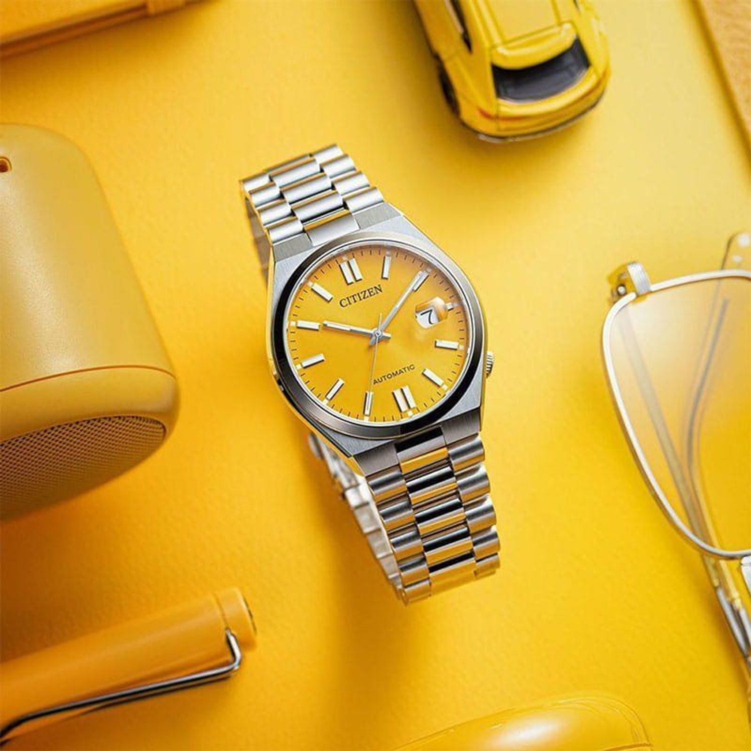 Zegarek męski Citizen Tsuyosa Yellow Automatic Classic Sapphire NJ0150-81Z. Męski zegarek automatyczny. Zegarek męski automatyczny na bransolecie. Męski zegarek z pomarańczową tarczą. Zegarek męski Citizen z datownikiem. Zegarek męski automatyc.jpg