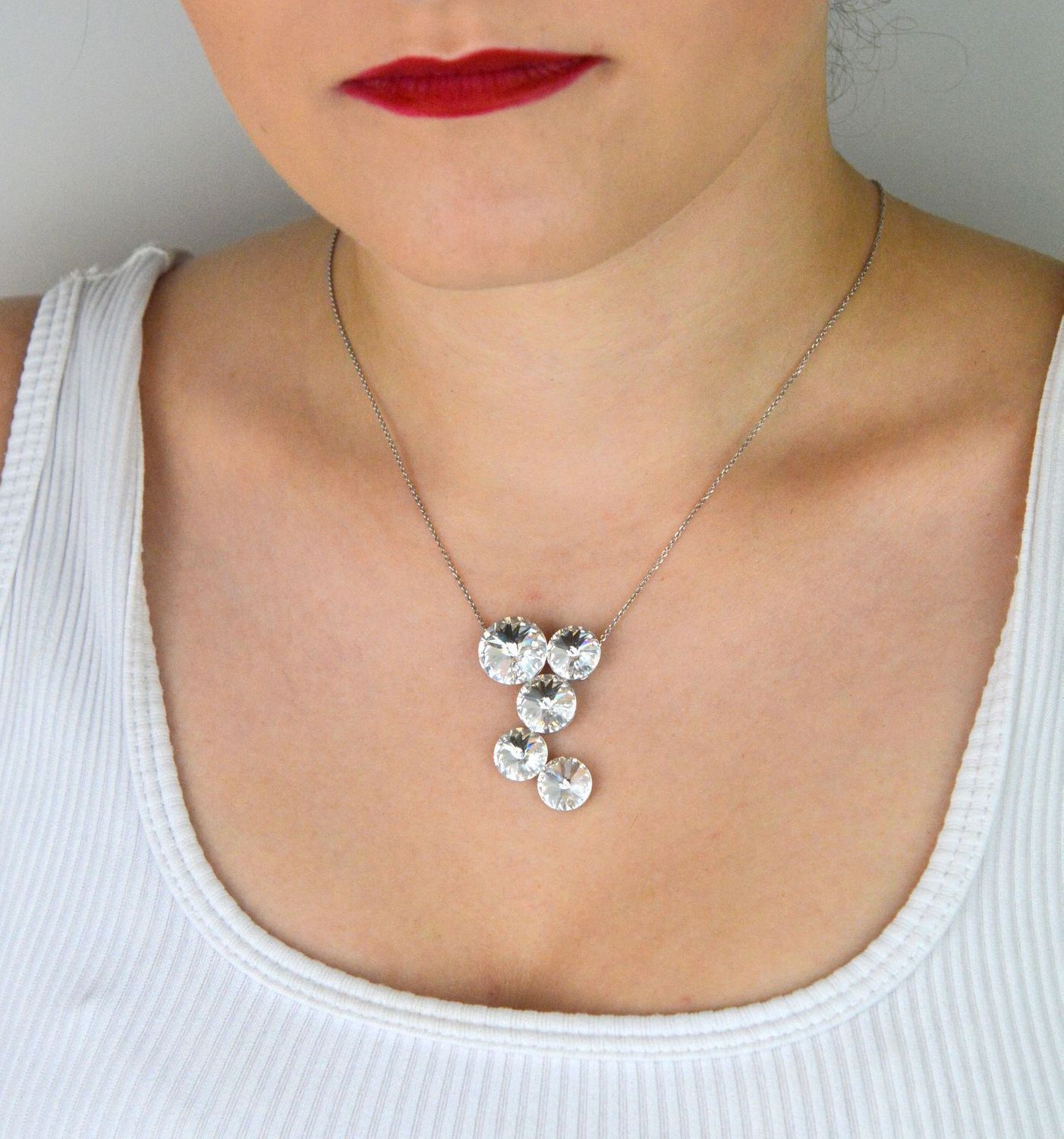 Naszyjnik damski srebrny 925 NK1122C z zawieszką zdobioną kryształami Crystals w kolorze Crystal. Długość 41+4 cm, zapięcie na karabińczyk. Elegancja i subtelny blask.1.jpg