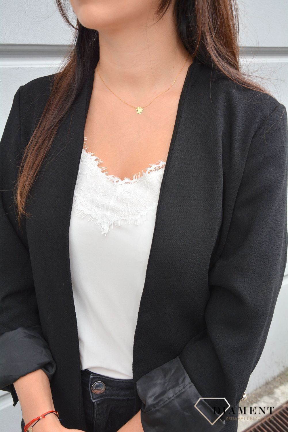 Złoty naszyjnik celebrytka puzzel.jpg