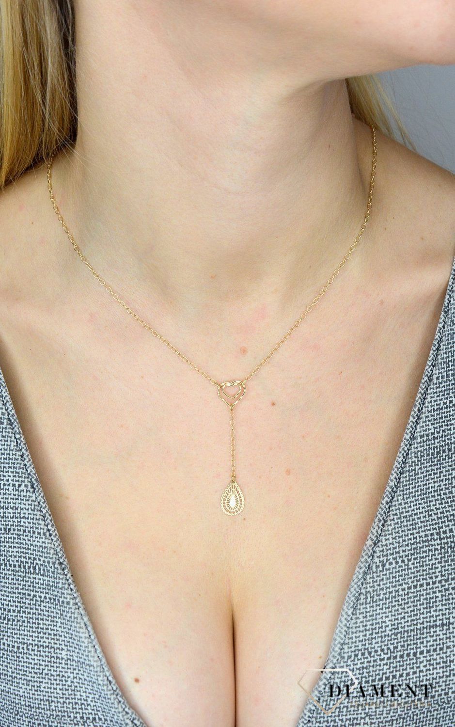 Naszyjnik złota celebrytka 585 krawatka serduszko z łezką. Prezentowany złoty naszyjnik damski  to doskonała propozycja dla kobiet, które cenią sobie efektowne i zarazem proste dodatki..jpg