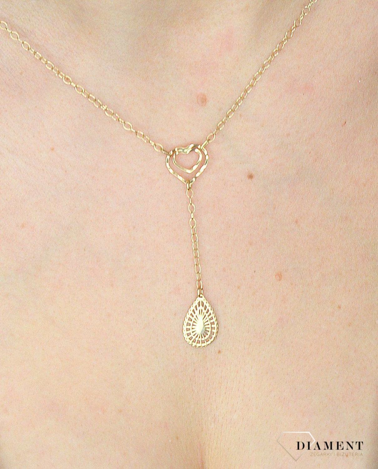 Naszyjnik złota celebrytka 585 krawatka serduszko z łezką. Prezentowany złoty naszyjnik damski  to doskonała propozycja dla kobiet, które cenią sobie efektowne i zarazem proste dodatki..jpg