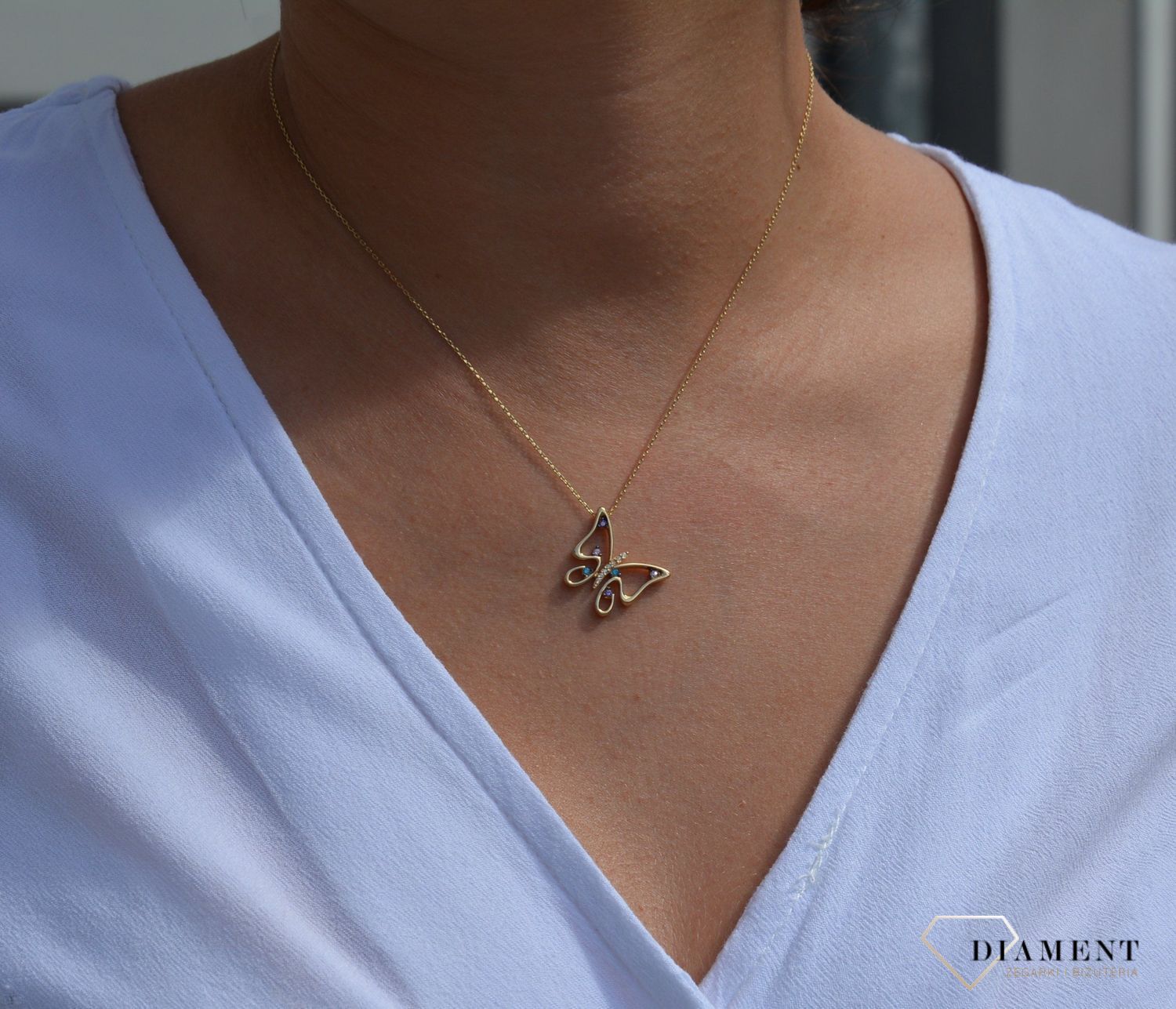 Złoty naszyjnik celebrytka 585 'motyl z cyrkonią'.jpg