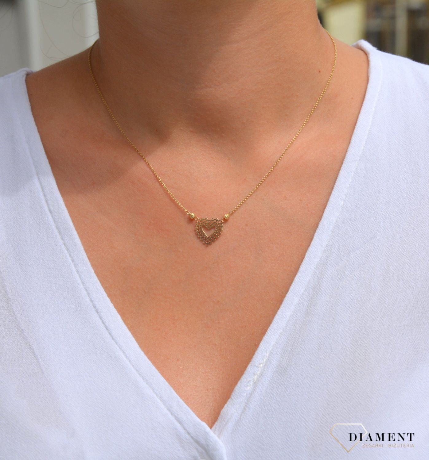 Złoty naszyjnik celebrytka 585 ażurowe serce z złotymi kuleczkami.jpg