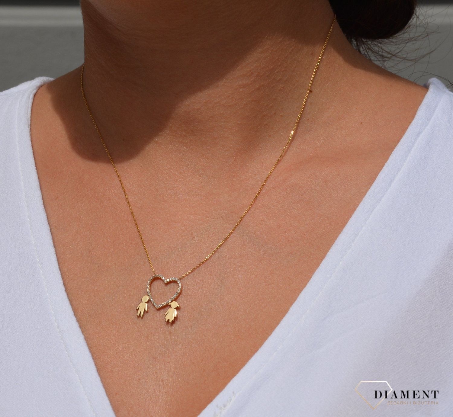 Złoty naszyjnik celebrytka 585 serce z cyrkonią i dziećmi.jpg
