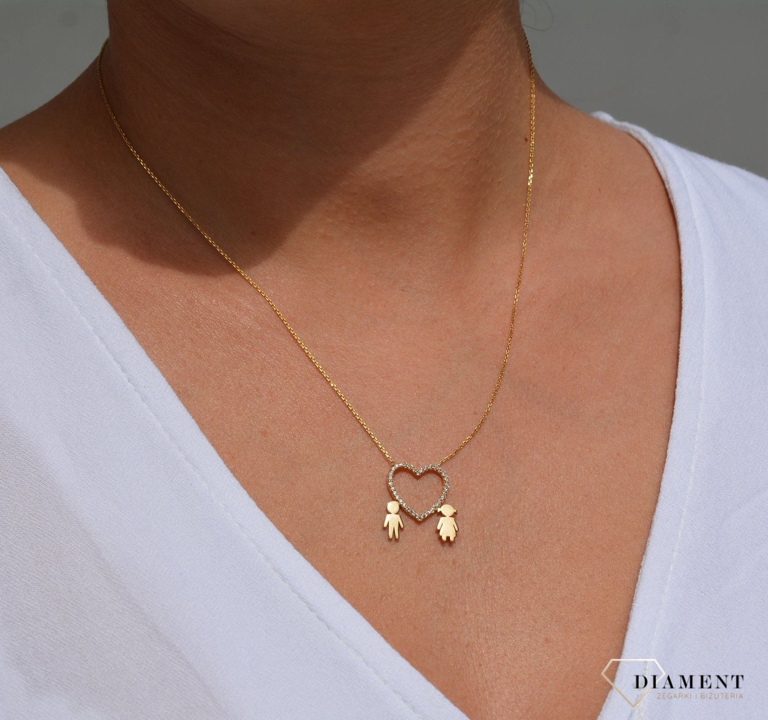 Złoty naszyjnik celebrytka 585 serce z cyrkonią i dziećmi.jpg