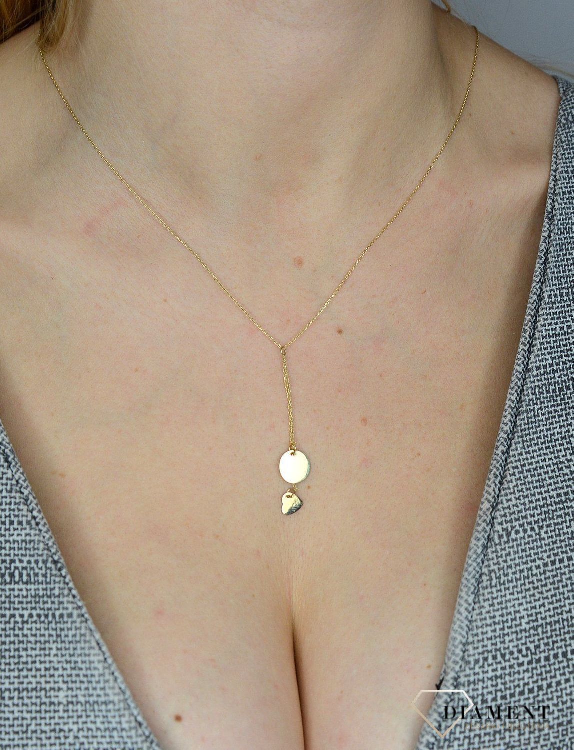 Naszyjnik złota celebrytka krawatka 585 blaszka z serduszkiem. Prezentowany złoty naszyjnik damski  to doskonała propozycja dla kobiet, które cenią sobie efektowne i zarazem proste dodatki..jpg