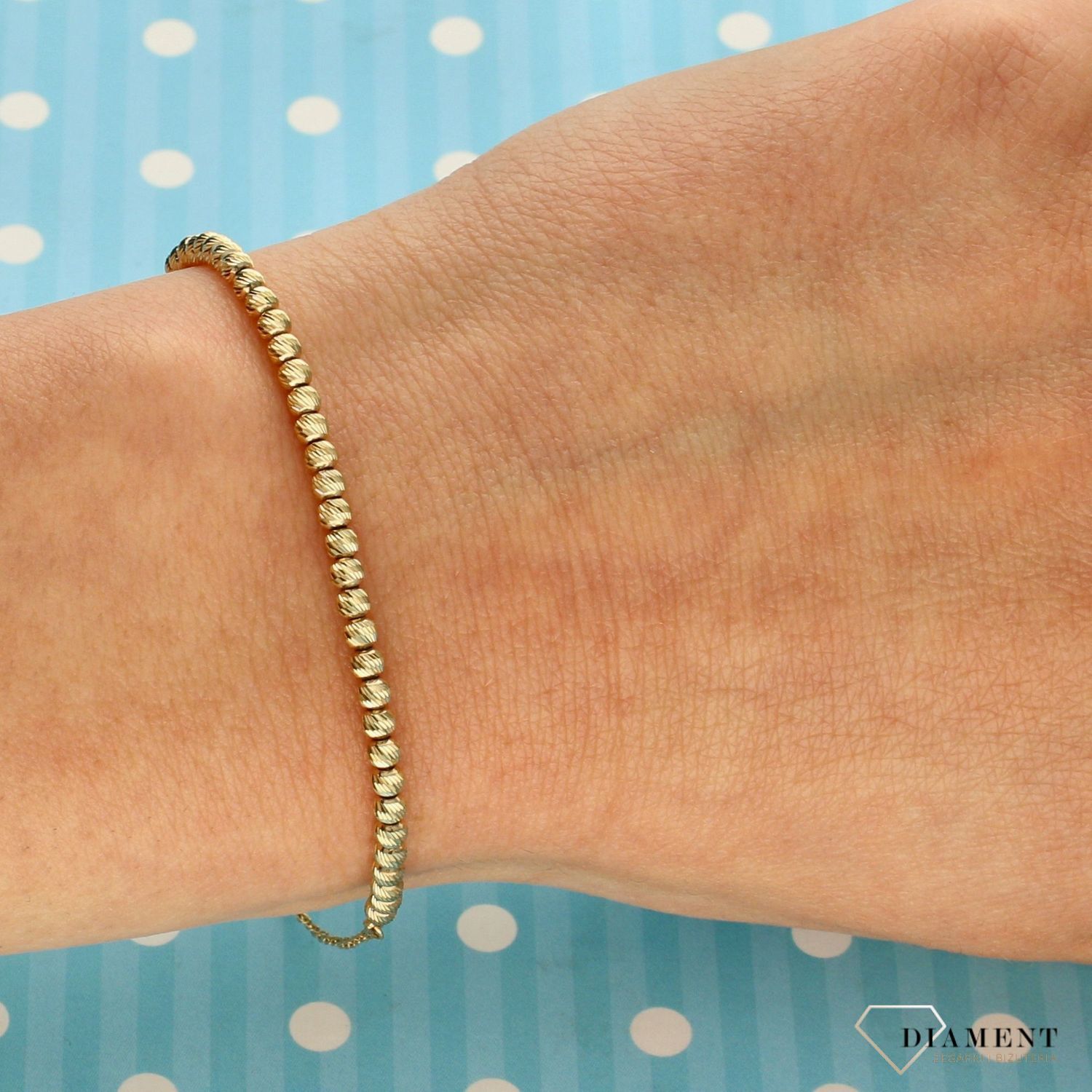 Bransoletka damska ze złota grawerowane kuleczki OPB000000-035 (1).jpg