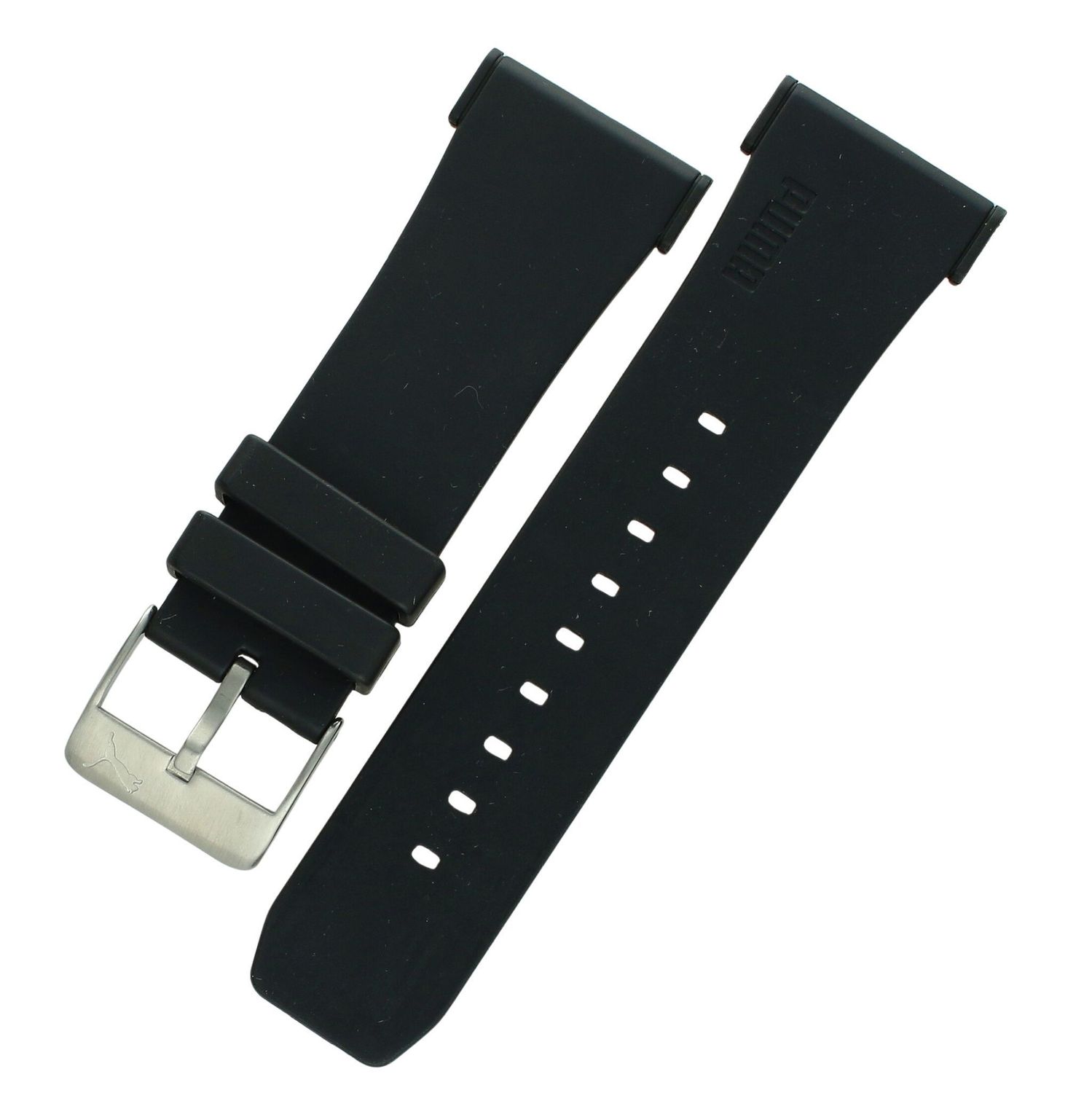 Oryginalny pasek PUMA PU102941006 wykonany z kauczuku. Kolor czarny, czarna klamerka. Szerokość 28 mm przy kopercie i 22 mm przy klamerce. Długość 75 mm + 115 mm. Idealny do zegarków z mocowaniem 28 mm.1.jpg