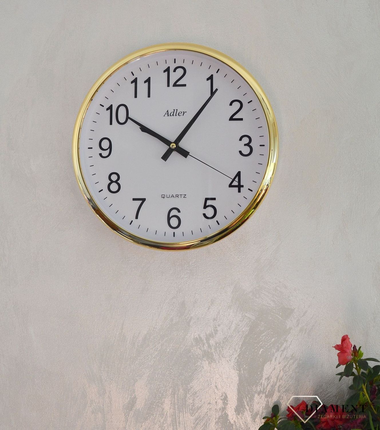 Zegar ścienny okrągły Adler złoty PW110-1700-G. Zegar ścienny okrągły zasilany za pomocą baterii. Zegar ścienny okrągły z tworzywa sztucznego w kolorze złotym z czarnymi dodatkami. Zegar ścienny (2).JPG