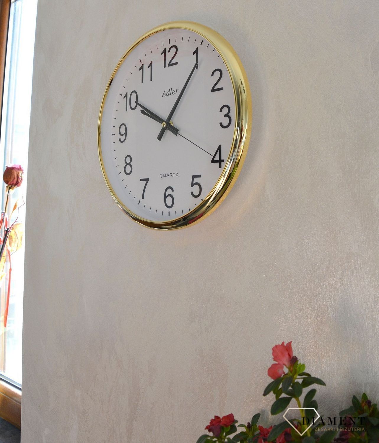 Zegar ścienny okrągły Adler złoty PW110-1700-G. Zegar ścienny okrągły zasilany za pomocą baterii. Zegar ścienny okrągły z tworzywa sztucznego w kolorze złotym z czarnymi dodatkami. Zegar ścienny (2).JPG