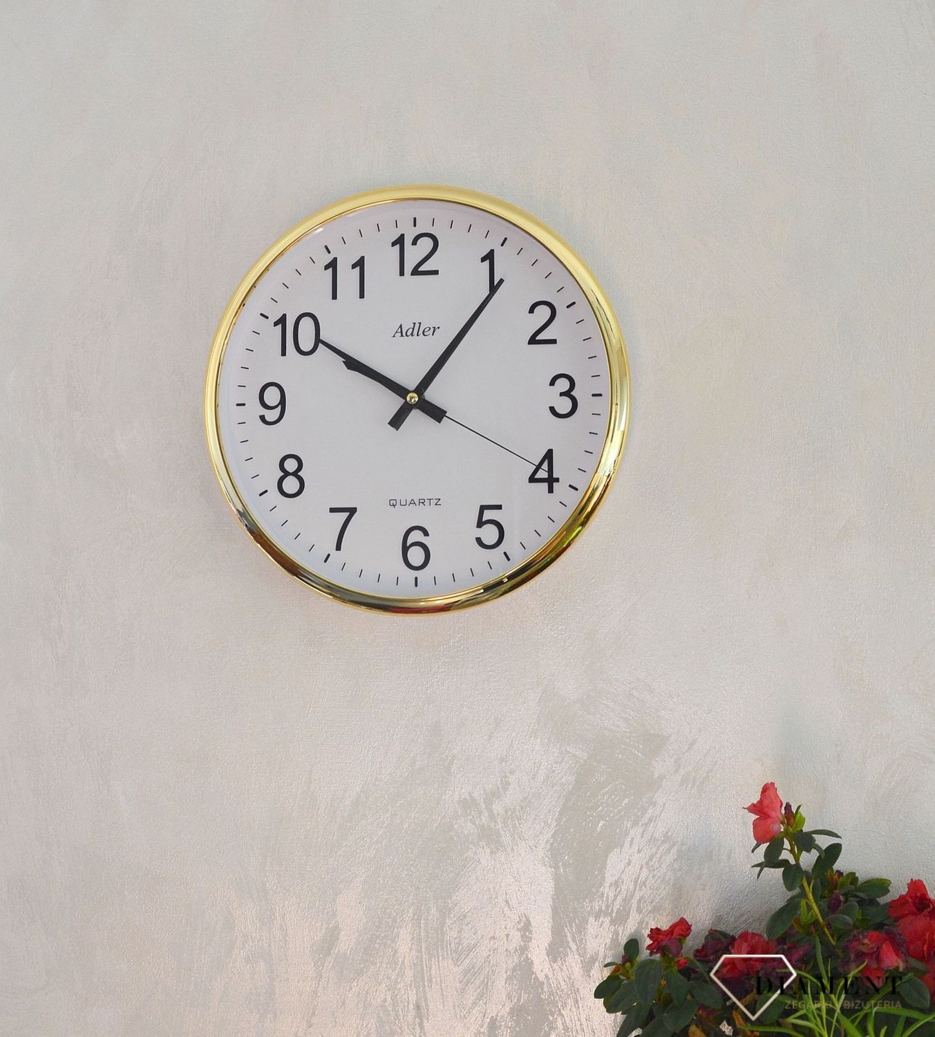 Zegar ścienny okrągły Adler złoty PW110-1700-G. Zegar ścienny okrągły zasilany za pomocą baterii. Zegar ścienny okrągły z tworzywa sztucznego w kolorze złotym z czarnymi dodatkami. Zegar ścienny (2).JPG