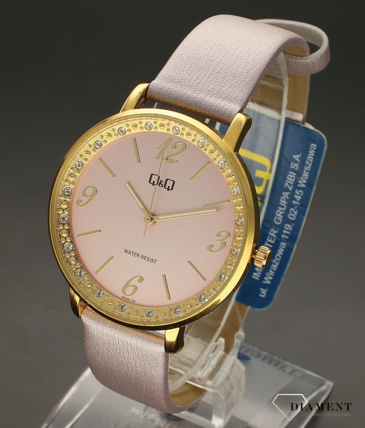 Zegarek damski na pasku QQ QC09-105. Zegarek z cyrkoniami. Zegarek z różową tarcza. Zegarek w złotym kolorze. Zegarek idealny na prezent (3).jpg