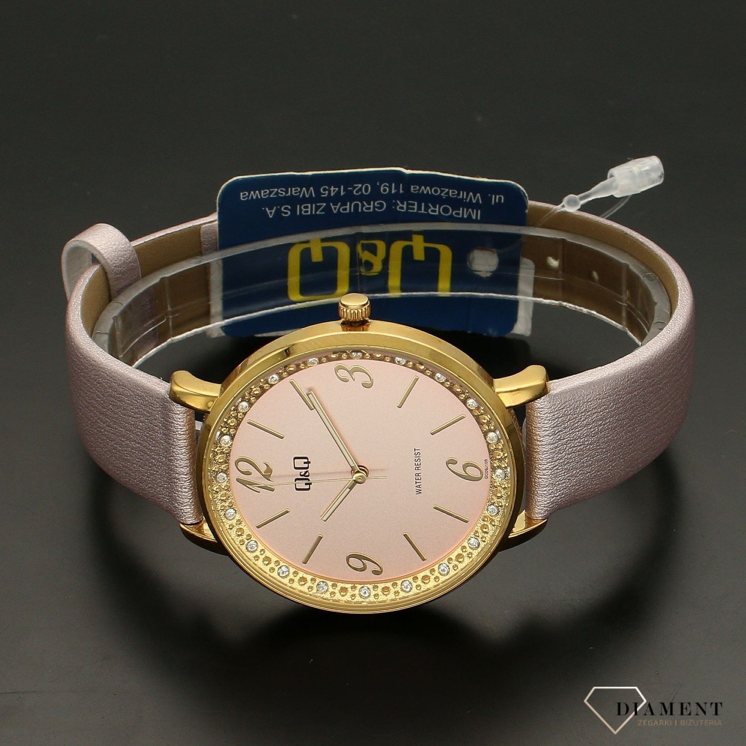 Zegarek damski na pasku QQ QC09-105. Zegarek z cyrkoniami. Zegarek z różową tarcza. Zegarek w złotym kolorze. Zegarek idealny na prezent (3).jpg