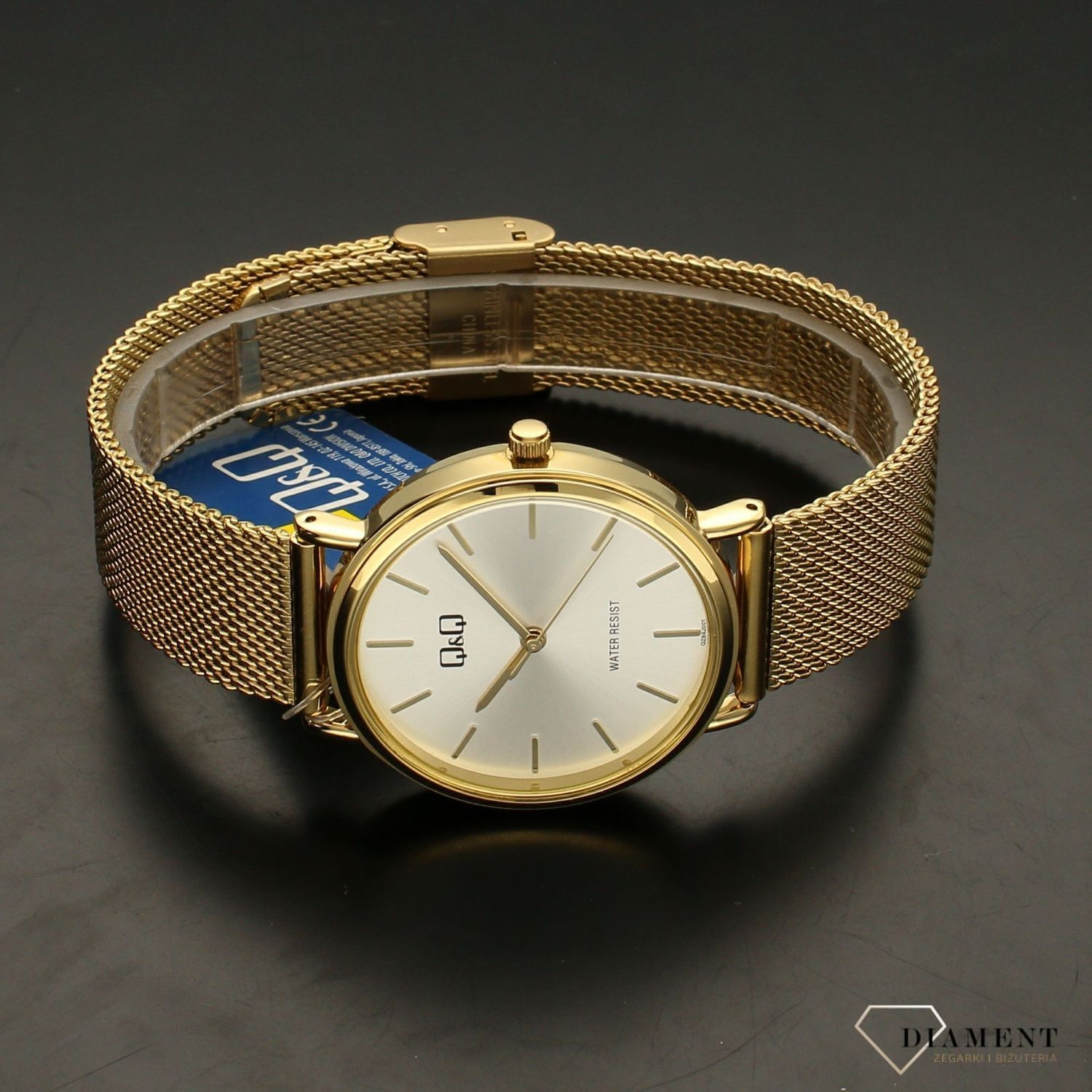 Zegarek damski na zlotej bransolecie QQ QZ84-001.jpg