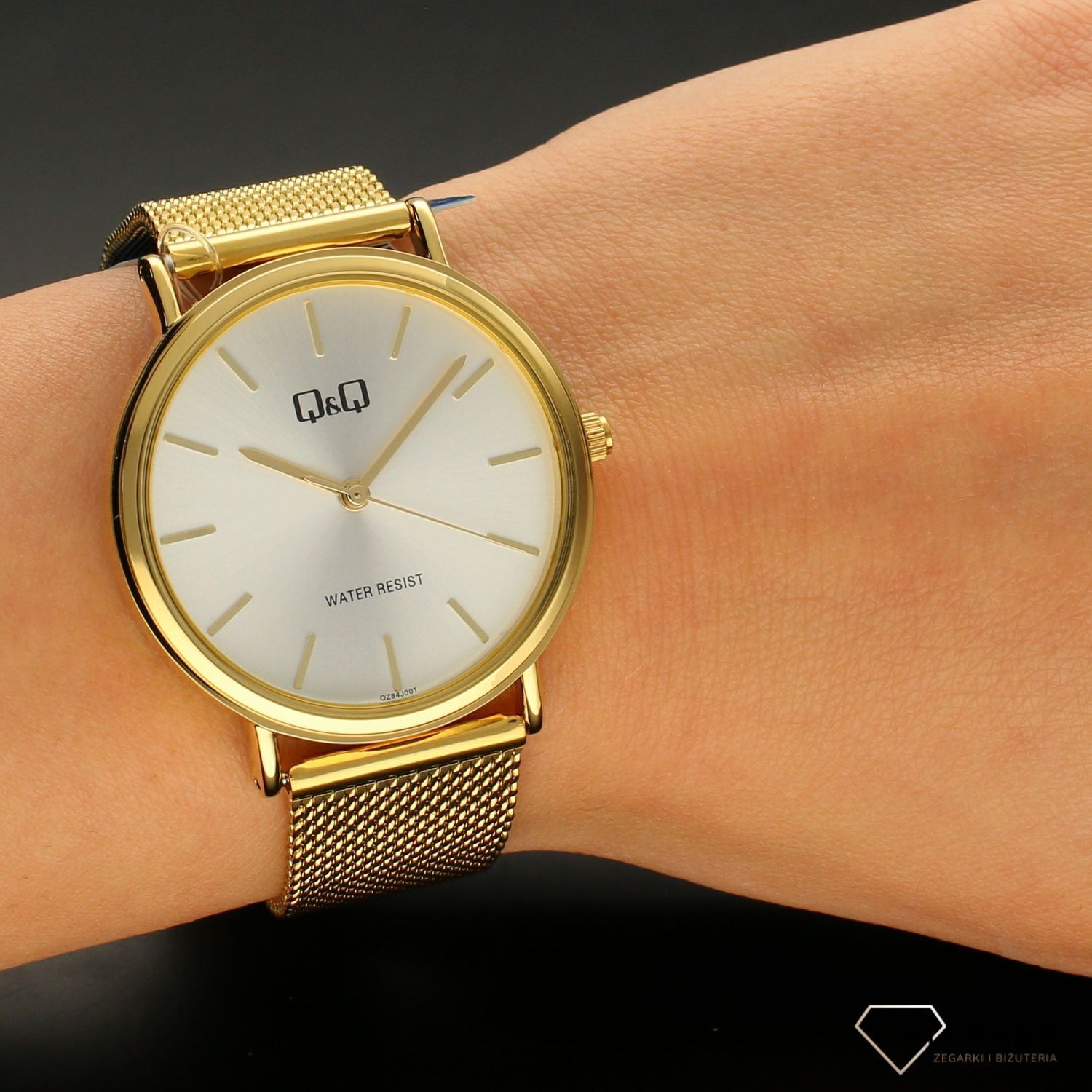 Zegarek damski na zlotej bransolecie QQ QZ84-001.jpg