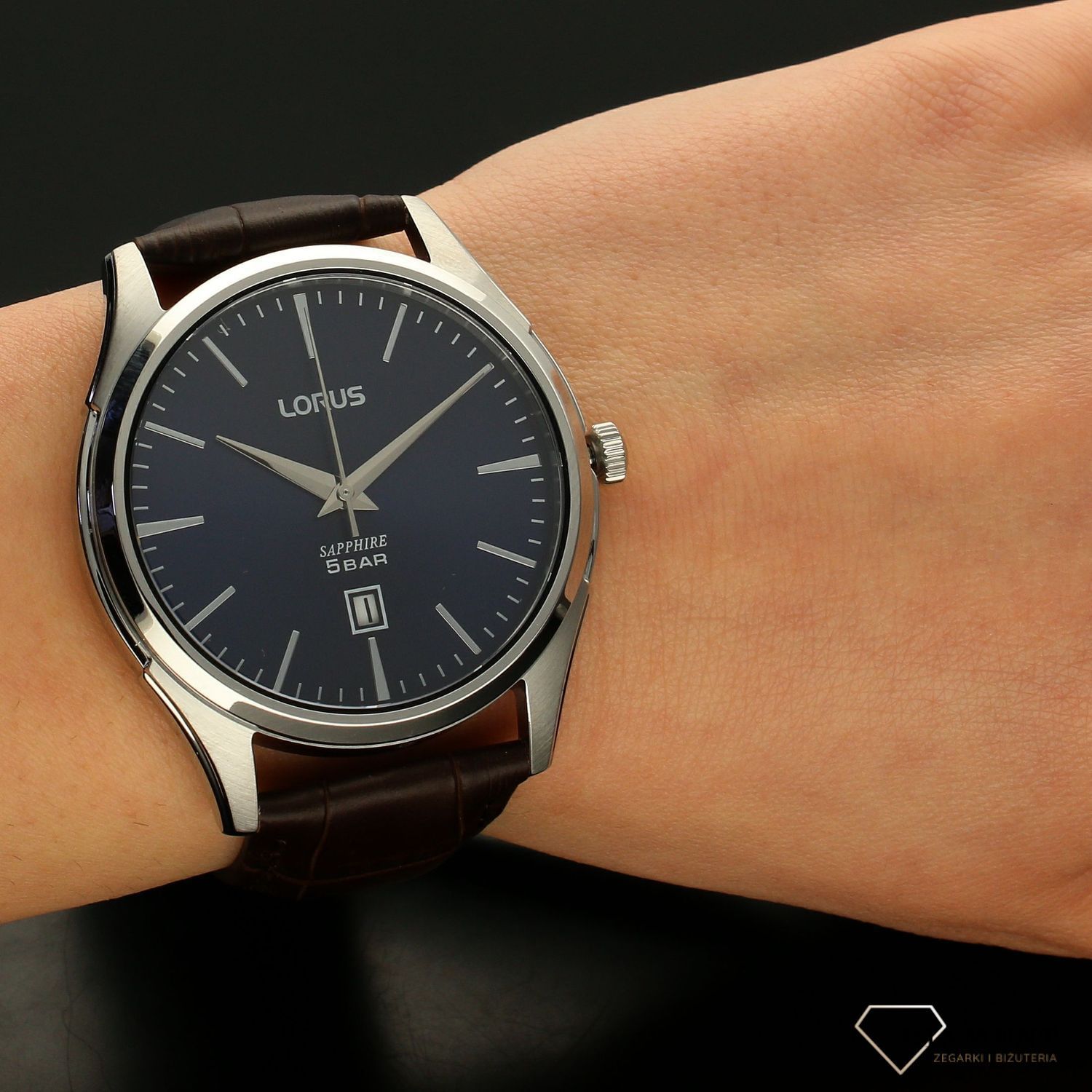 Zegarek męski na brązowym pasku z niebieską tarczą LORUS RH957NX9 (1).jpg