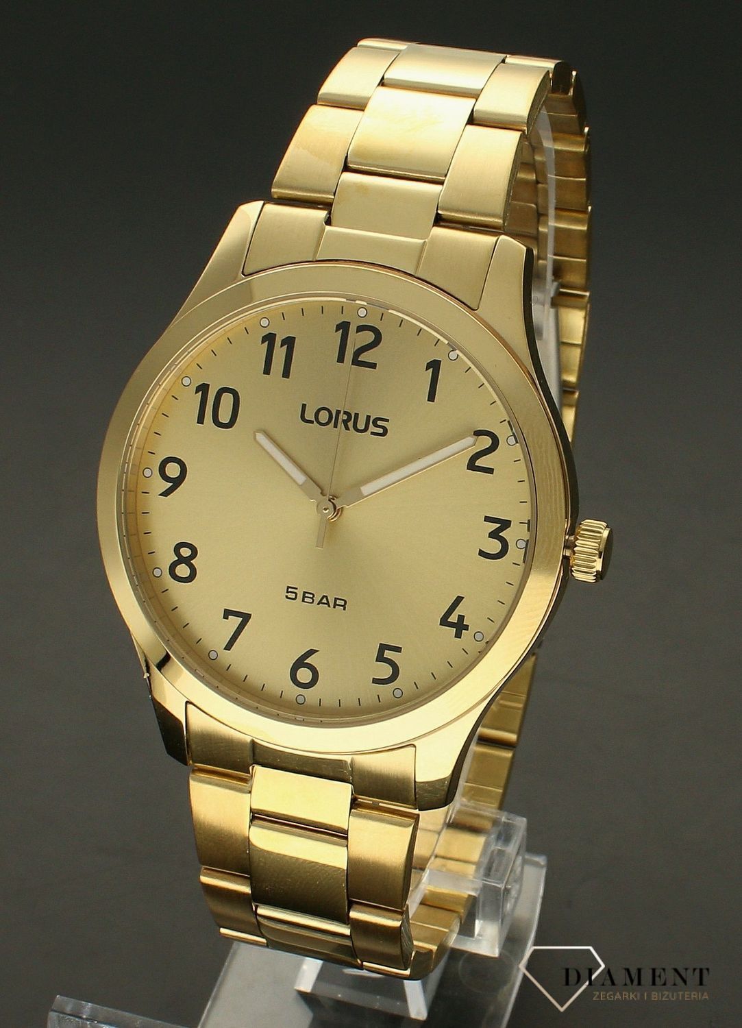 Zegarek męski Lorus RRX02JX9. Zegarek męski Lorus na bransolecie RRX02JX9 w złotym kolorze wyposażony jest w kwarcowy mechanizm, zasilany za pomocą baterii. Męski zegarek Lorus na złotej bransolecie. Klasyczny zegarek męski idealny na prezent.jpg
