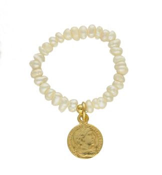 Pierścionek damski srebrny z perłą RS3014v65. Modny pierścionek z ozdobnych kuleczek na gumce to intrygująca biżuteria która spodoba się niezależnej, odważnej kobiecie, kochającej wyraziste dodatki, które podkreślają osobowo.jpg