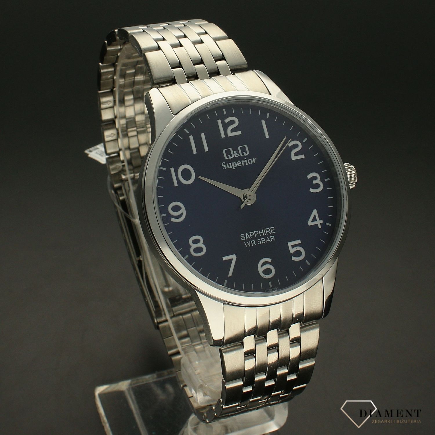 Zegarek damski na bransolecie stalowej z niebieską tarczą i białymi cyframi QQ S280-205 ⌚.webp