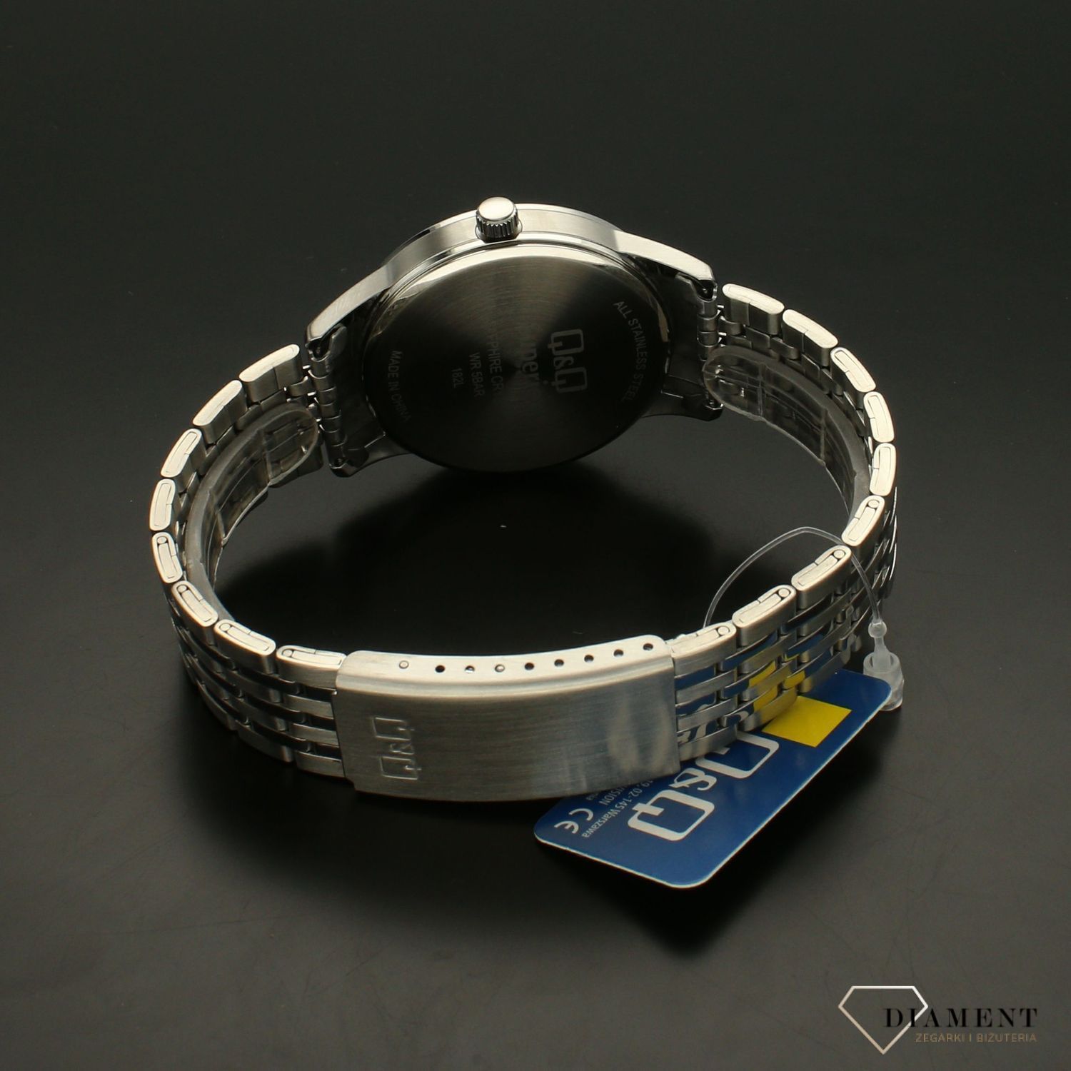 Zegarek damski na bransolecie stalowej z niebieską tarczą i białymi cyframi QQ S280-205 ⌚.webp