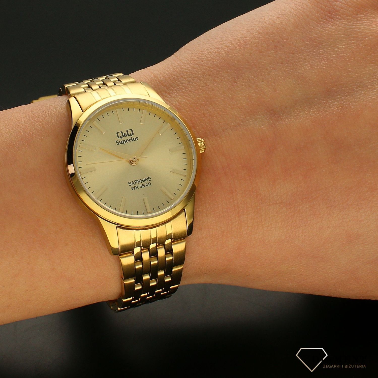 Zegarek damski na złotej bransolecie z czytelną tarczą S281-010⌚.webp