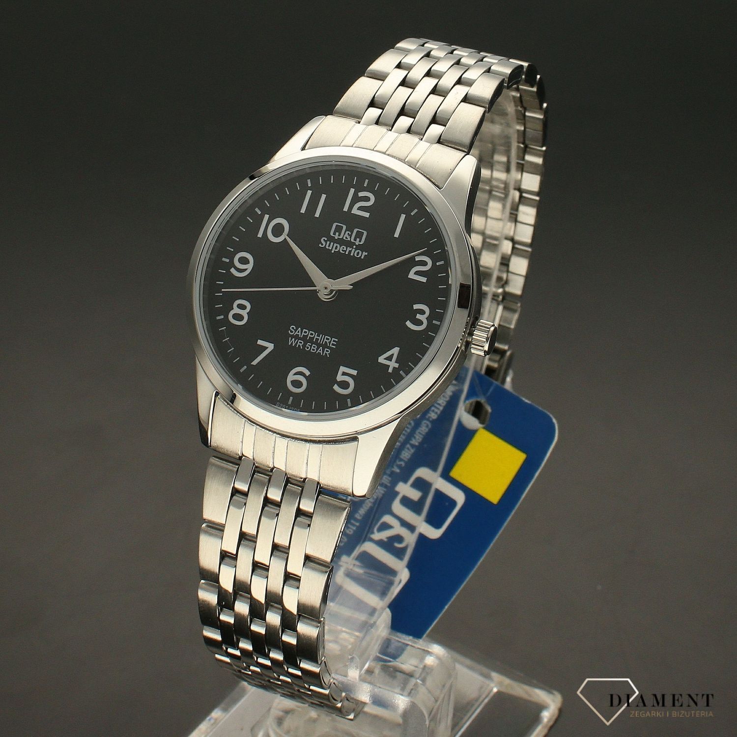 Zegarek damski na bransolecie stalowej z czarną tarczą i białymi cyframi QQ S281-205 ⌚.webp