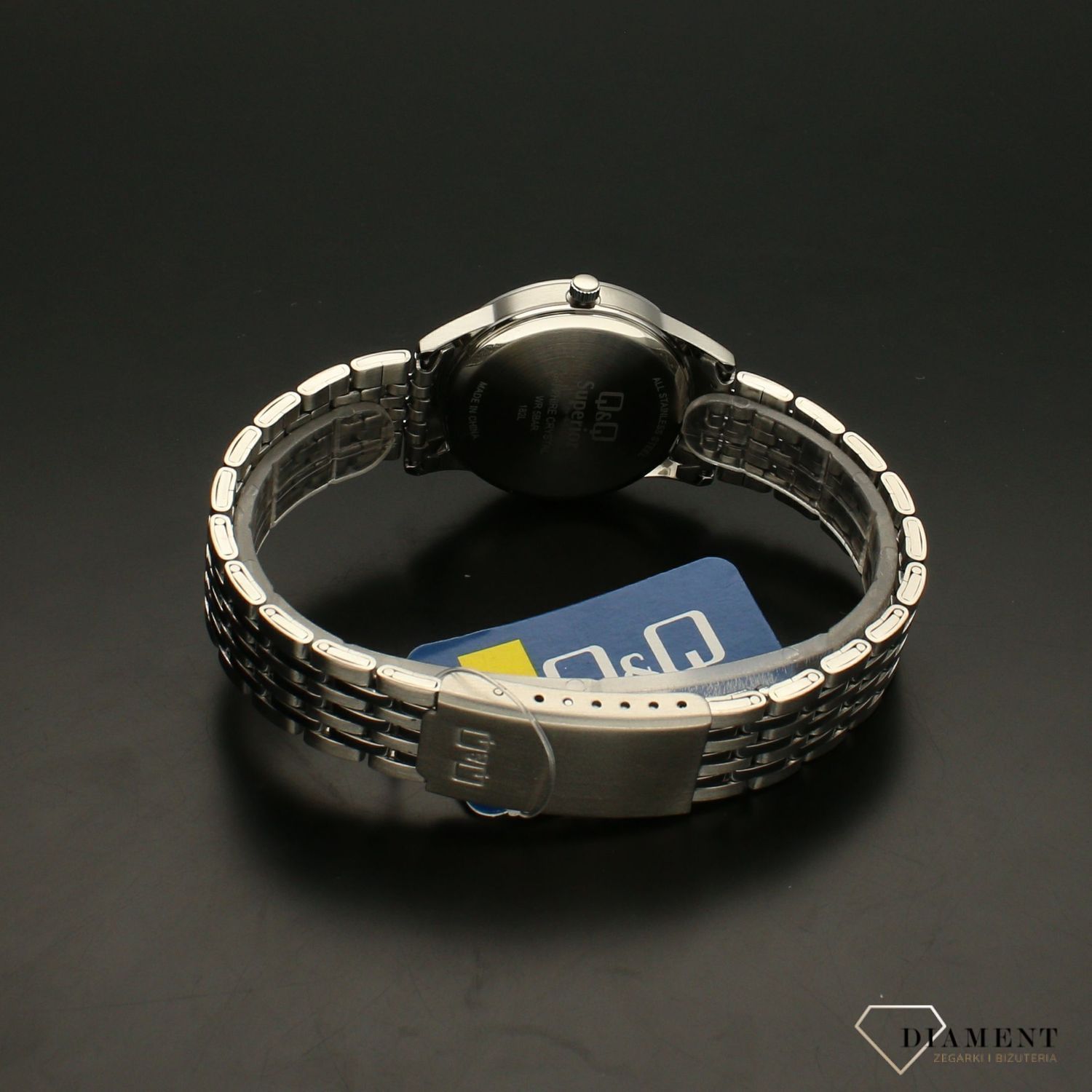 Zegarek damski na bransolecie stalowej z czarną tarczą i białymi cyframi QQ S281-205 ⌚.webp