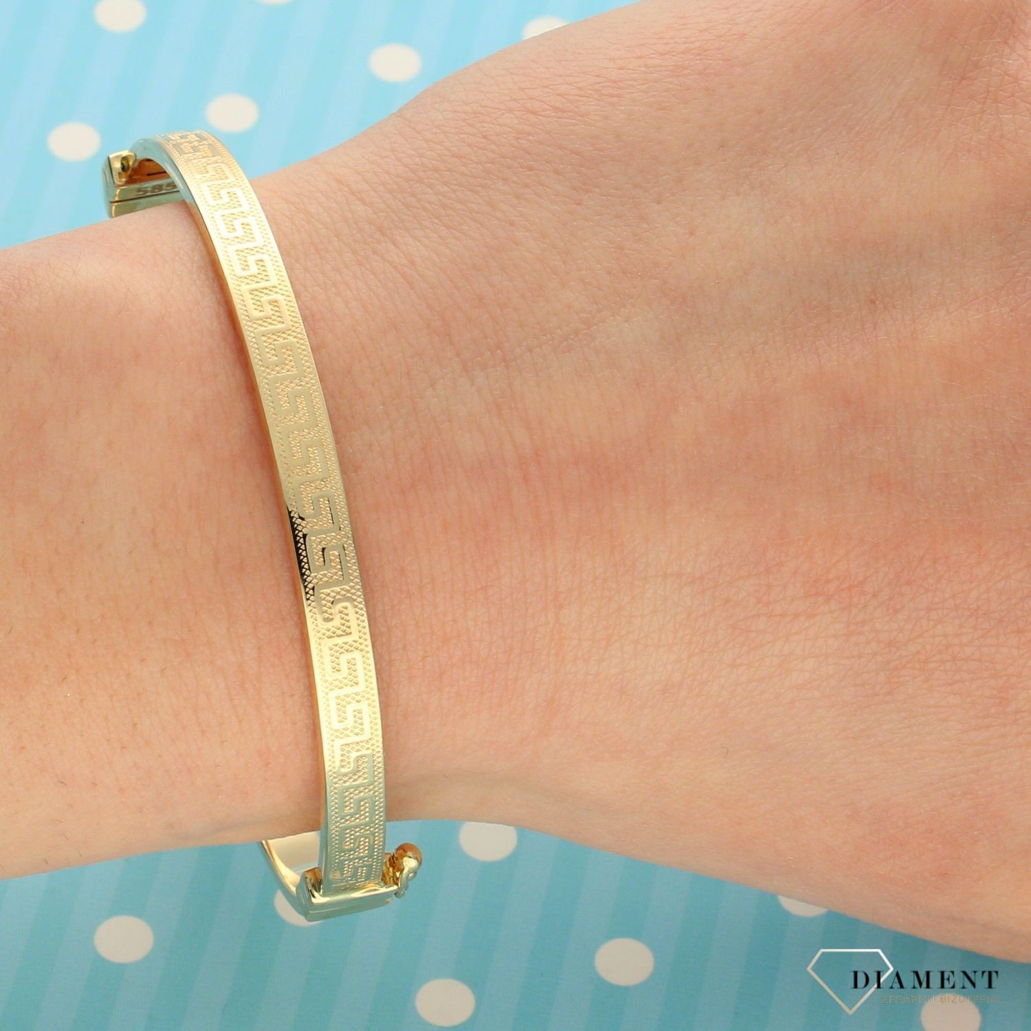 Złota bransoletka z modnym motywem drogi Greckiej to świetny pomysł na dodatek pasujący do większości stylizacji. Bransoletka wykonana z próby złota 585.   (2).jpg