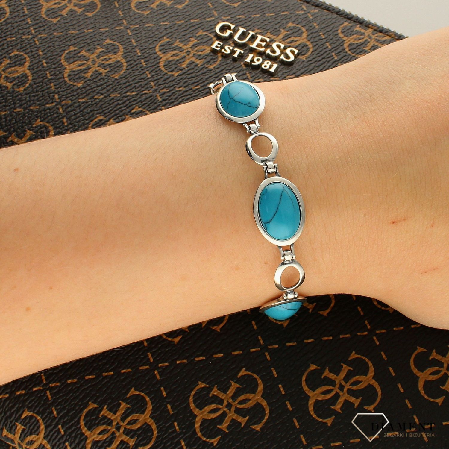 Srebrna Bransoletka z kamieniem Turkusu S2B000000-667. Bransoletka to idealny pomysł na prezent dla każdej kobiety. Zastosowana masa jubilerska w kolorze niebieskim idealnie komponuje się z otaczającym ją.jpg