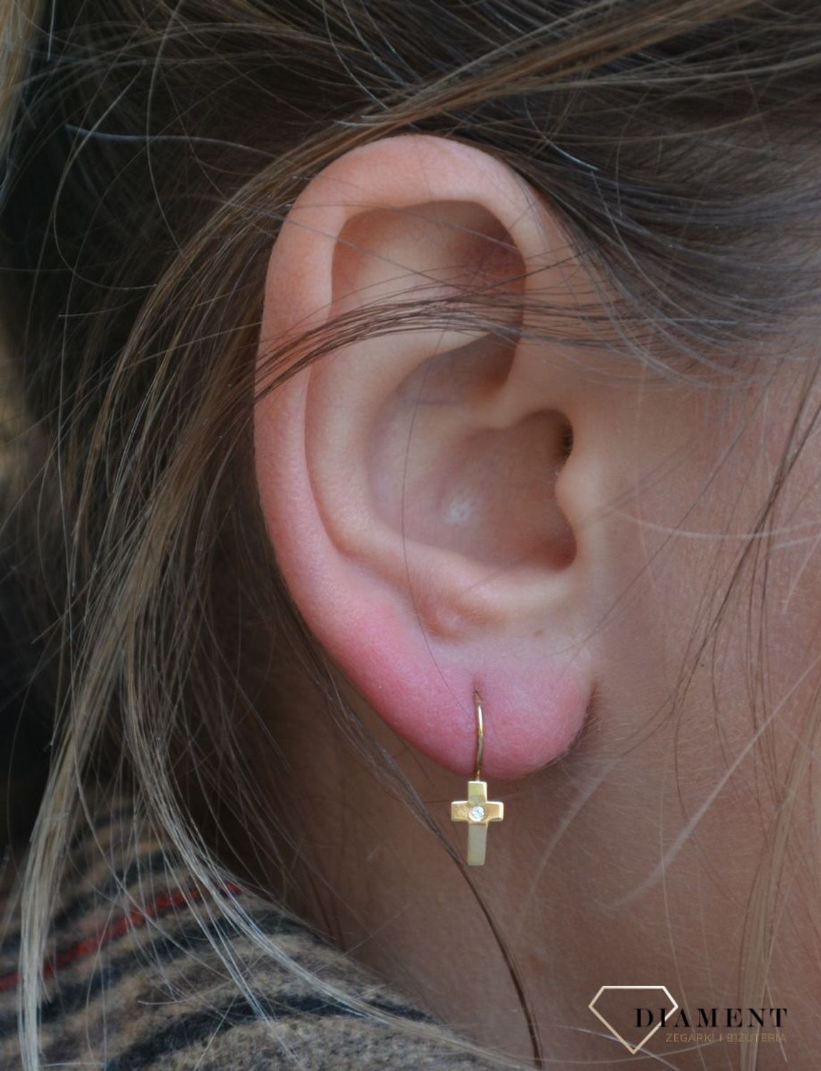 Złote kolczyki w kształcie krzyżyków z drobną cyrkonią na środku..jpg