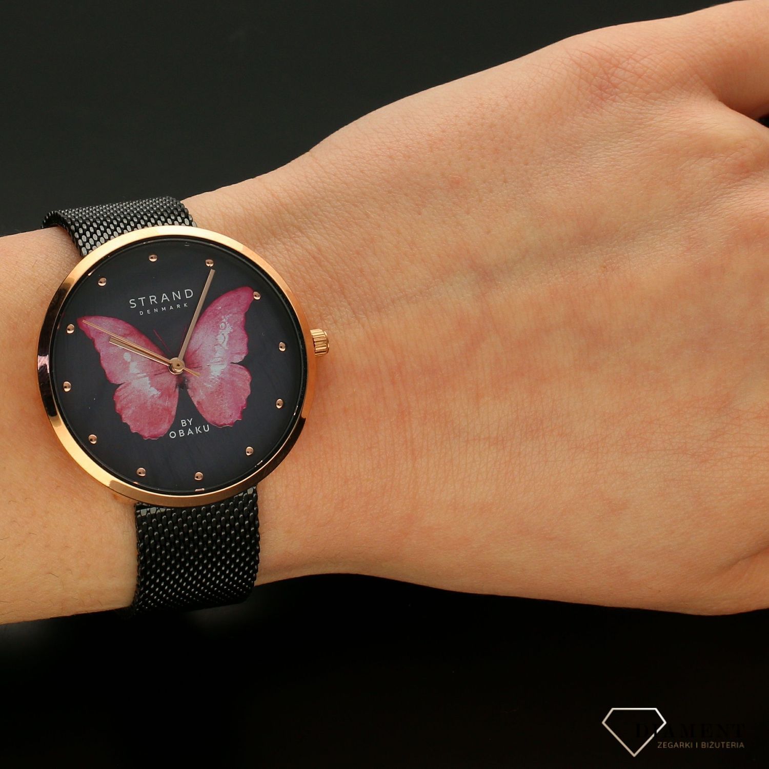 Zegarek damski STRAND Butterfly rożowy S700LXVBMB-DBP . Strand Butterfly to elegancki zegarek damski z oryginalną, czarną tarczą z masy perłowej, ozdobioną motywem różowego motyla. Zegarek damski posiada indeksy w k8.jpg