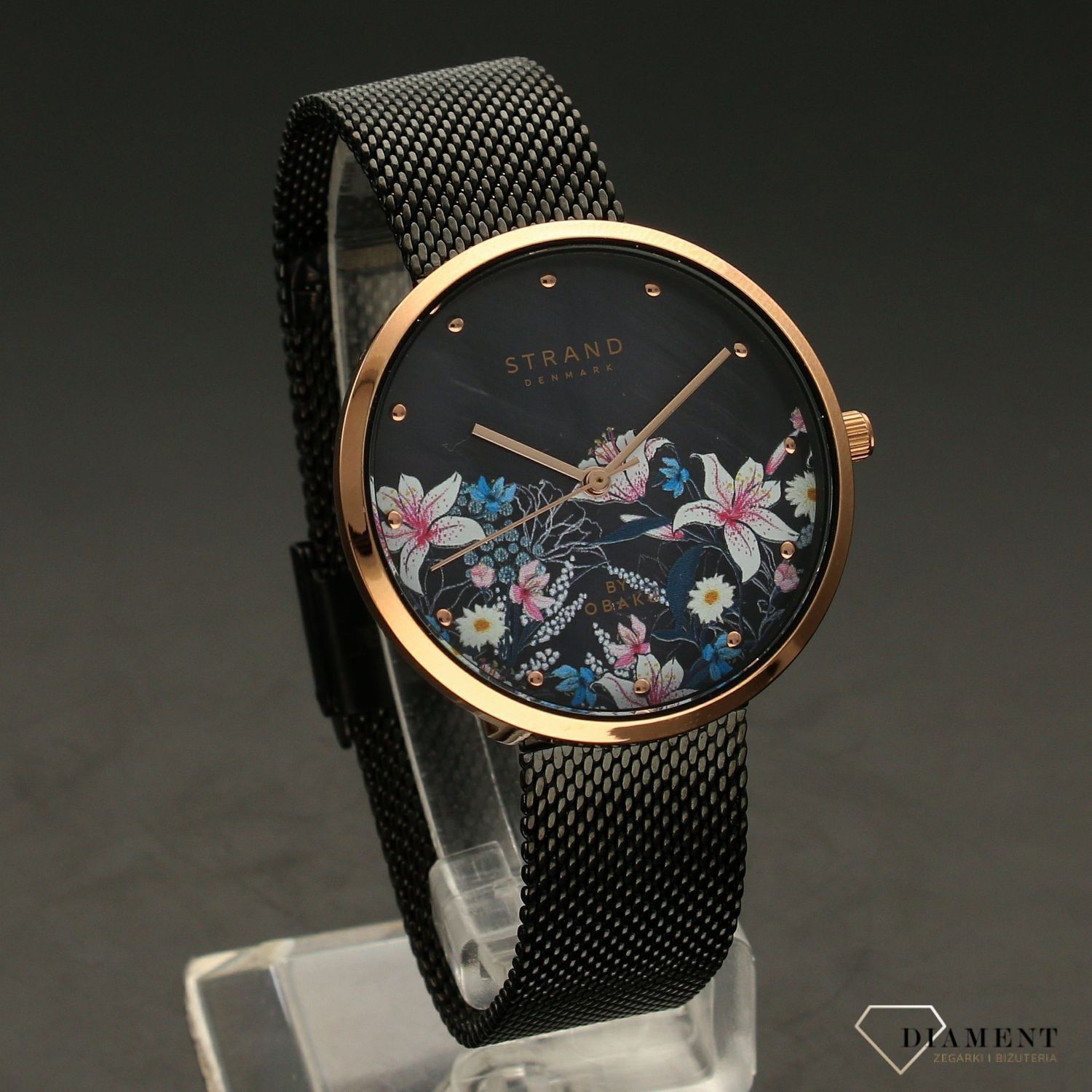 Zegarek damski STRAND Flower S700LXVBMB-DF. Strand Flower to elegancki zegarek damski z oryginalną, czarną tarczą z masy perłowej, ozdobioną motywem kwiatów. Zegarek damski posiada indeksy w kolorze różowego złota8.jpg