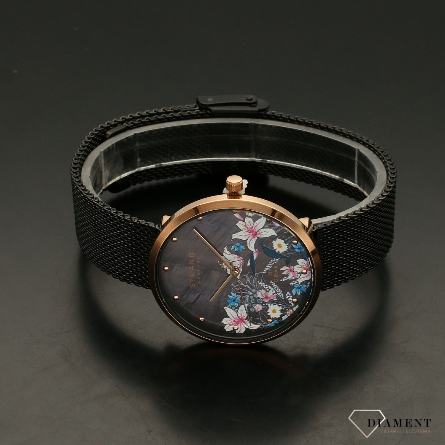 Zegarek damski STRAND Flower S700LXVBMB-DF. Strand Flower to elegancki zegarek damski z oryginalną, czarną tarczą z masy perłowej, ozdobioną motywem kwiatów. Zegarek damski posiada indeksy w kolorze różowego złota8.jpg
