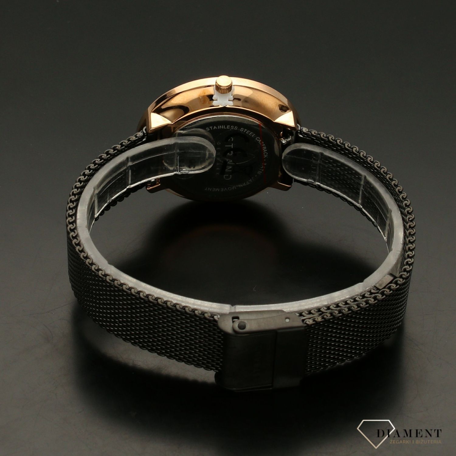 Zegarek damski STRAND Flower S700LXVBMB-DF. Strand Flower to elegancki zegarek damski z oryginalną, czarną tarczą z masy perłowej, ozdobioną motywem kwiatów. Zegarek damski posiada indeksy w kolorze różowego złota8.jpg