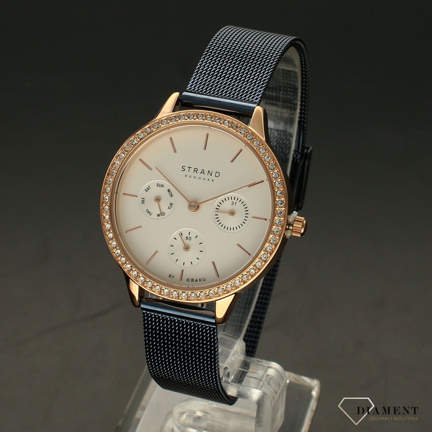 Zegarek damski STRAND Denmark S704LMVIML.. Strand Denmark to elegancki zegarek damski z oryginalną, białą tarczą oraz kopertą ozdobioną błyszczącymi kryształami Swarovskiego. Zegarek damski posiada indeksy w kolorze7.jpg