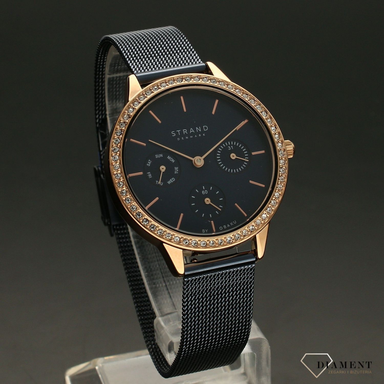 Zegarek damski STRAND Denmark S704LMVLML . Strand Denmark to elegancki zegarek damski z oryginalną, granatową tarczą oraz kopertą ozdobioną błyszczącymi kryształami Swarovskiego. Zegarek damski posiada indeksy w kol8.jpg