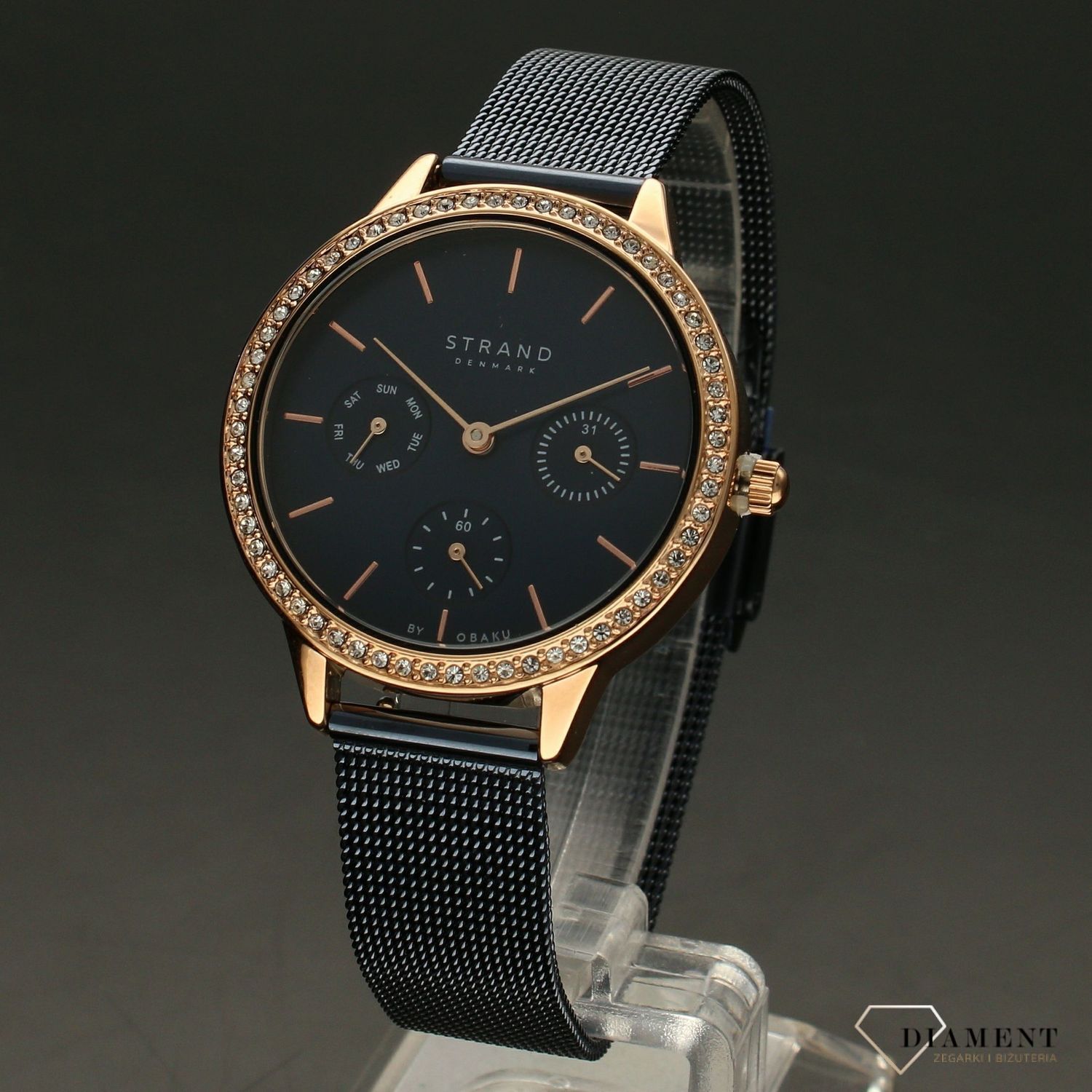 Zegarek damski STRAND Denmark S704LMVLML . Strand Denmark to elegancki zegarek damski z oryginalną, granatową tarczą oraz kopertą ozdobioną błyszczącymi kryształami Swarovskiego. Zegarek damski posiada indeksy w kol8.jpg