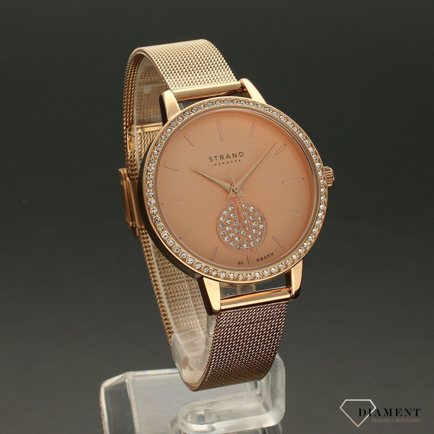 Zegarek damski STRAND Denmark S705LXVVMV.  Strand Denmark to elegancki zegarek damski z oryginalną, różową tarczą ozdobioną błyszczącymi kryształami Swarovskiego. Zegarek damski posiada indeksy w kolorze różowego zł8.jpg